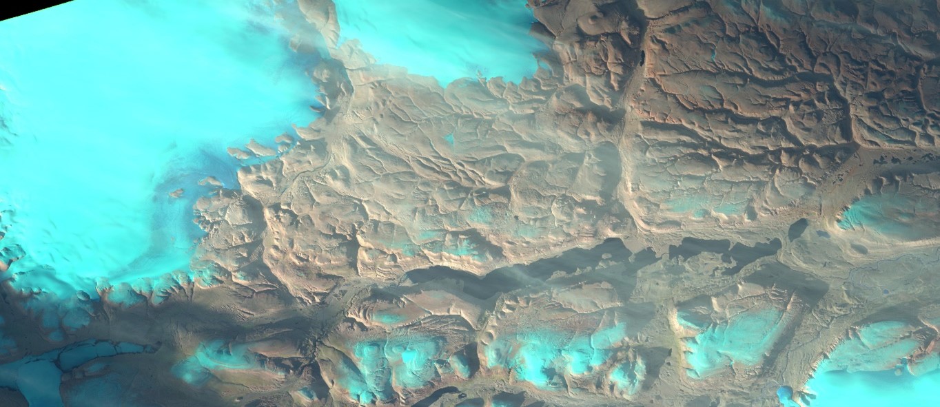 Satellite image of an area of Northern Greenland, showing the range of glacial and incised fluvial valleys.