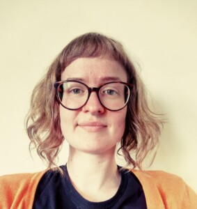 A photograph of the head and shoulders of a woman.