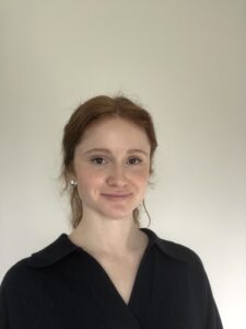 Photo of the head and shoulders of a woman.