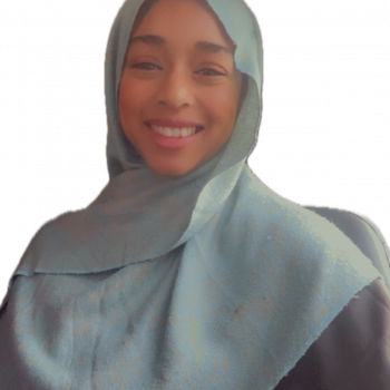 Photo of the head and shoulders of a woman.