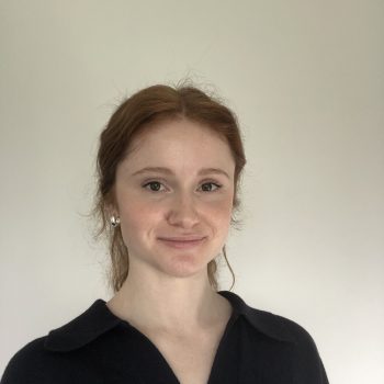 Photo of the head and shoulders of a woman.