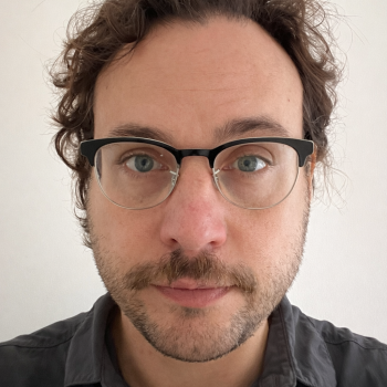 A photo of the head and shoulders of a man.