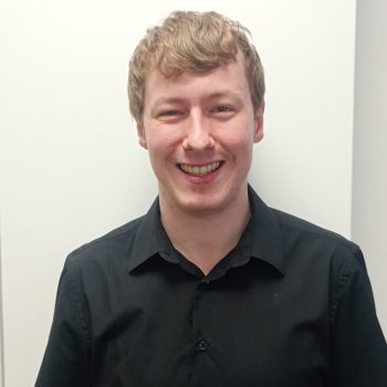 A photo of the head and shoulders of a man.